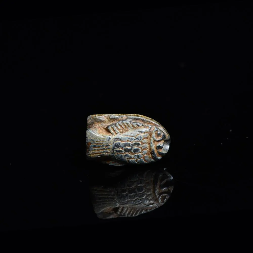 A royal Egyptian Steatite Fish Amulet, 18th Dynasty, reign of Thutmose III, ca. 1479-26 BCE