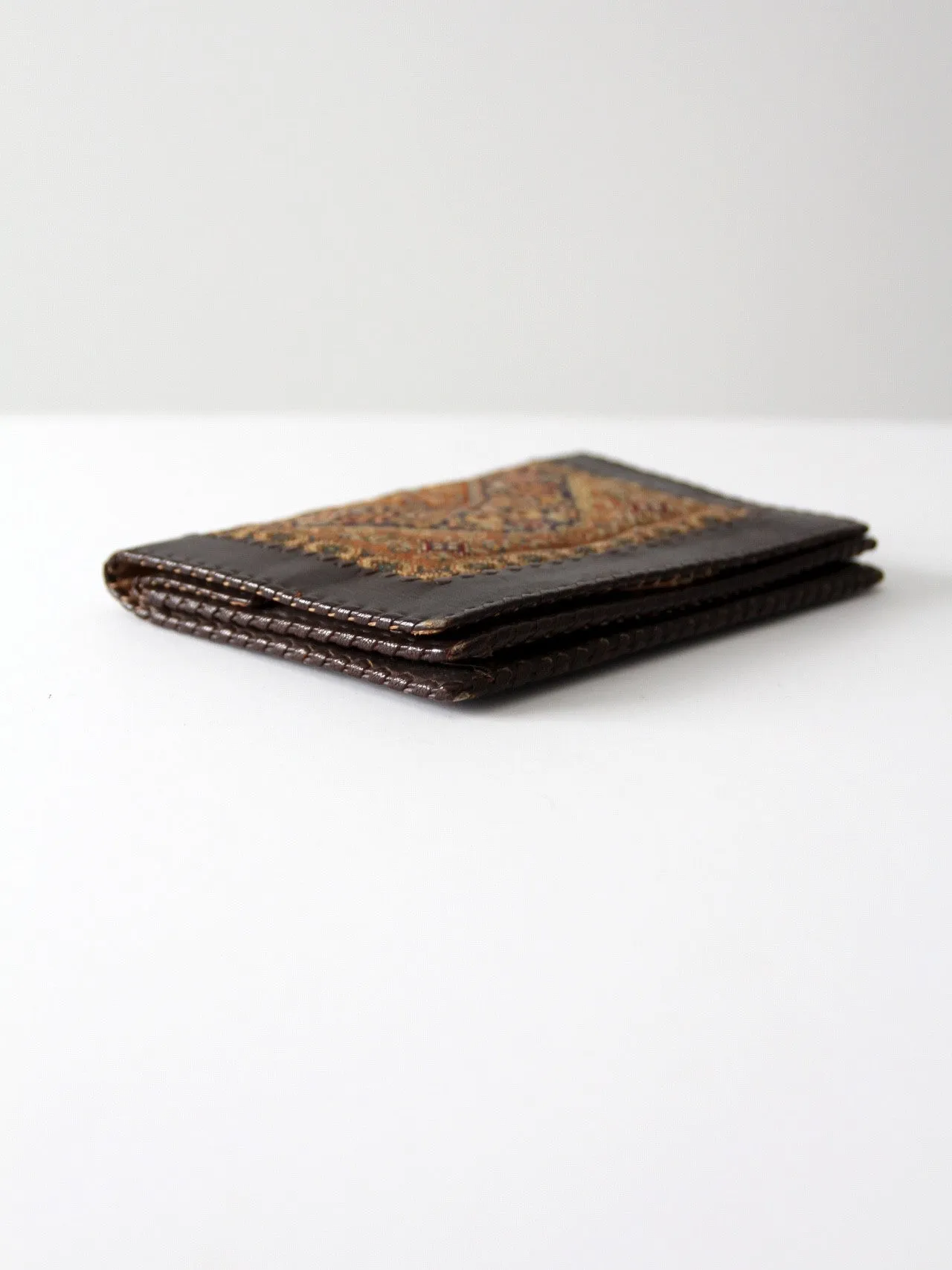 vintage tapestry and leather wallet